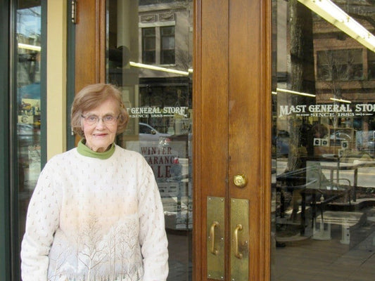 Mary Alice Shand standin in front of the Greenville Mast Store