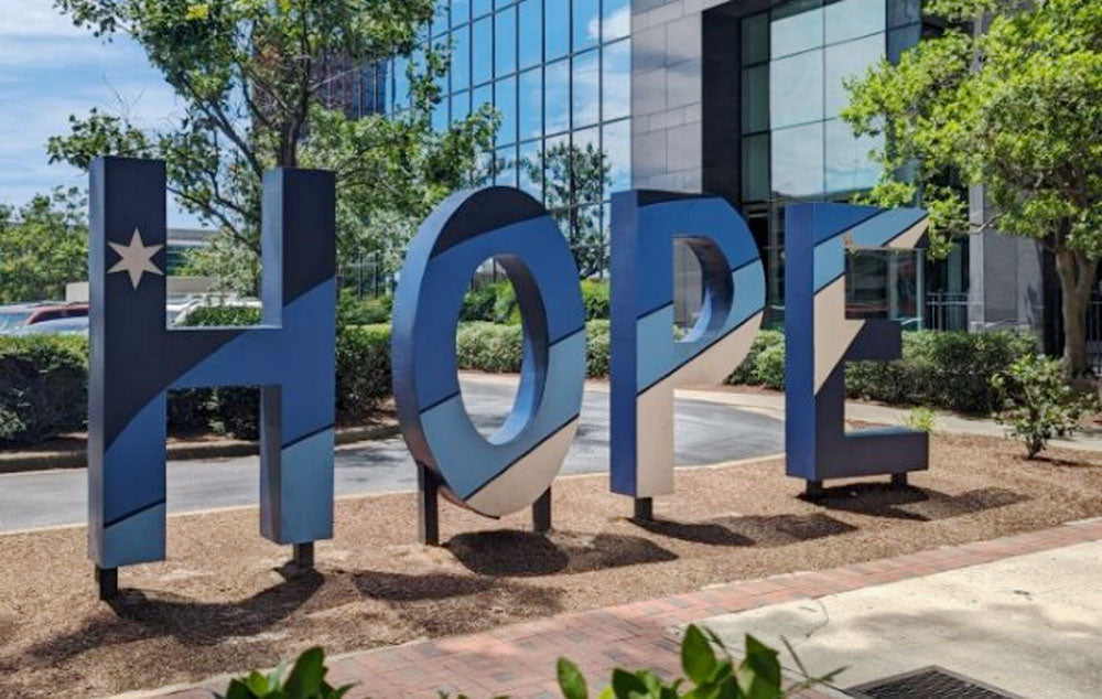 Columbia's City Flag in sculpture form spelling the word Hope