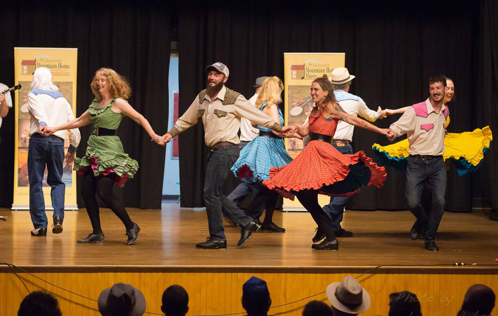 The Green Grass Cloggers perform a traditional clogging routine