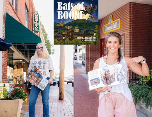 A woman on the left holds a book on a brick sidewalk in front of a store. On the right, a woman holds a book open to a page on a brick sidewalk in front of town hall. The Bats of Boone book is centered.