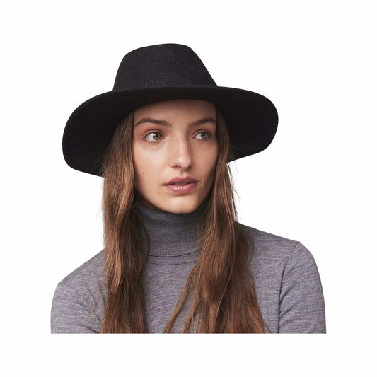Stylish black wide-brimmed hat paired with a gray turtleneck, showcasing a modern and chic look for fall fashion.