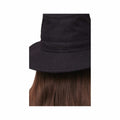 Black bucket hat with a minimalistic logo tag, designed for style and versatility.