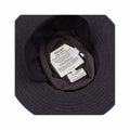 Interior view of a Tilley Tech Wool hat showcasing the label and care instructions, featuring a classic design for outdoor enthusiasts.