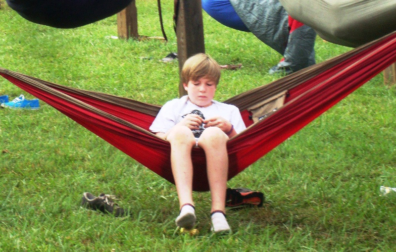 Great American Backyard Campout - boy in a hammock