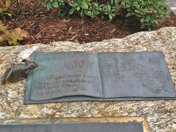 Mouse reading Goodnight Moon