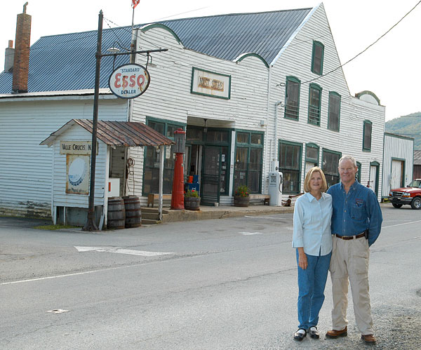 John and Faye Cooper in front of the Original Mast Store in Valle Crucis