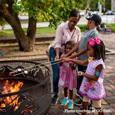 Roasting marshmallows at the Anthem GO Fest
