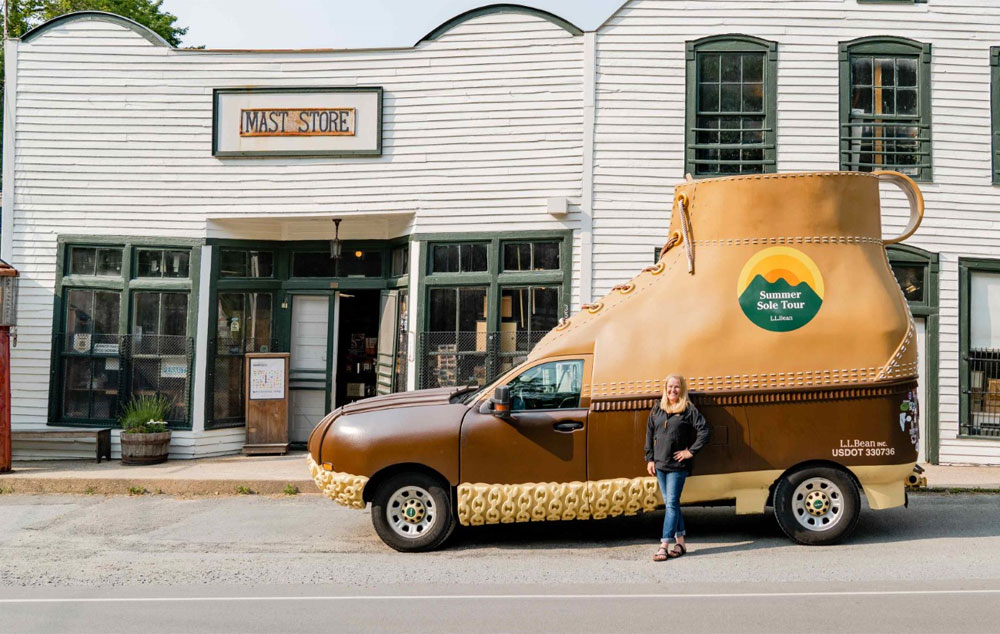 Lisa Cooper at the Original Mast Store standing in front of the L.L.Bean Boot