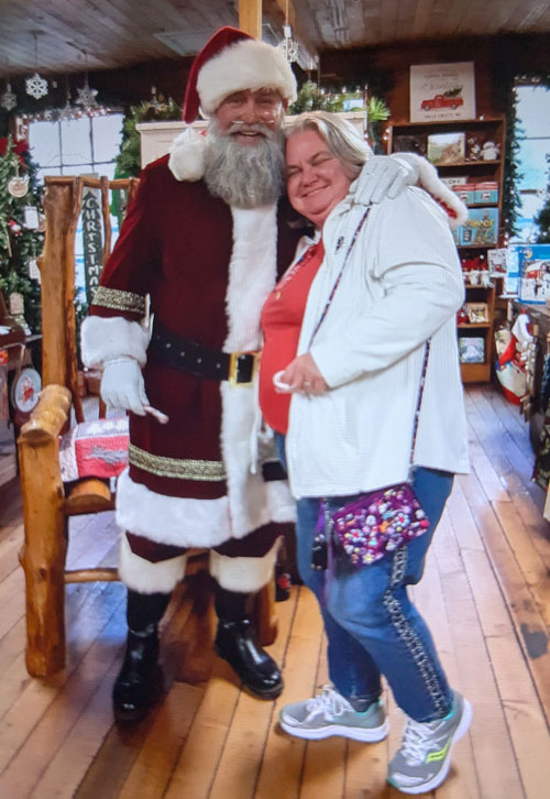 Renee shares a photo taken with Santa at the Original Store.